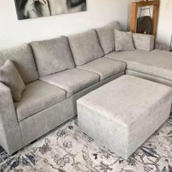 New Grey Sectional And Ottoman 