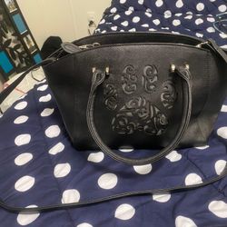 Cute medium purse- black- used 1 time for a family get together but no longer need it as I have may too many purses at the moment. Still looks basical