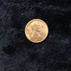 Lincoln Cent 1986 with error in ring and printed letters 