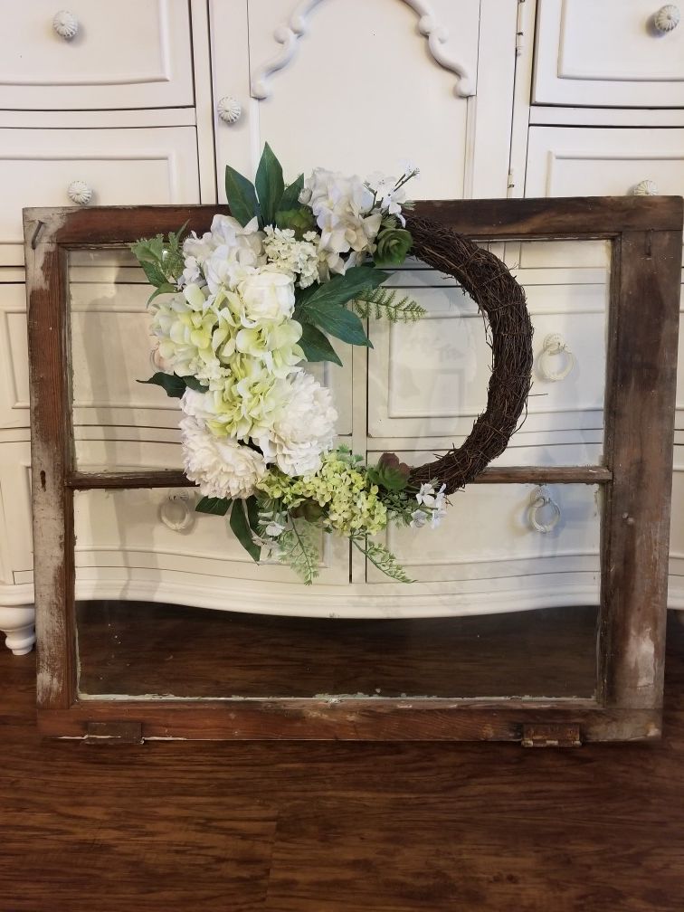 Old window with wreath