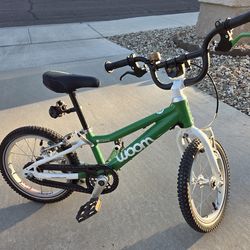 Woom 2 Green Pedal Bike with bell