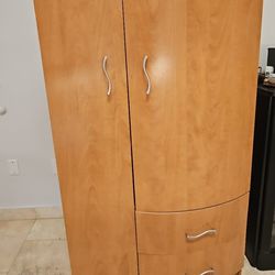 Two drawers dresser wood with doors that open.