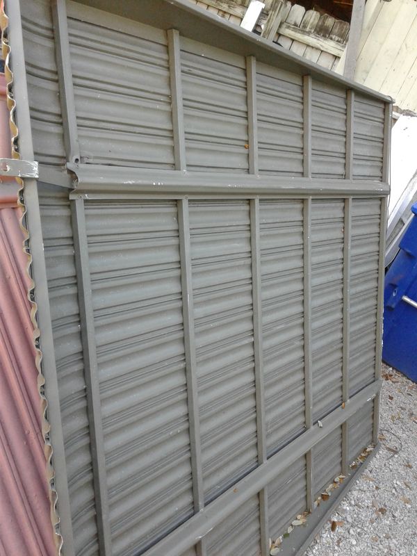 5 feet wide x 6 feet long Clamshell Awning with track and poles for