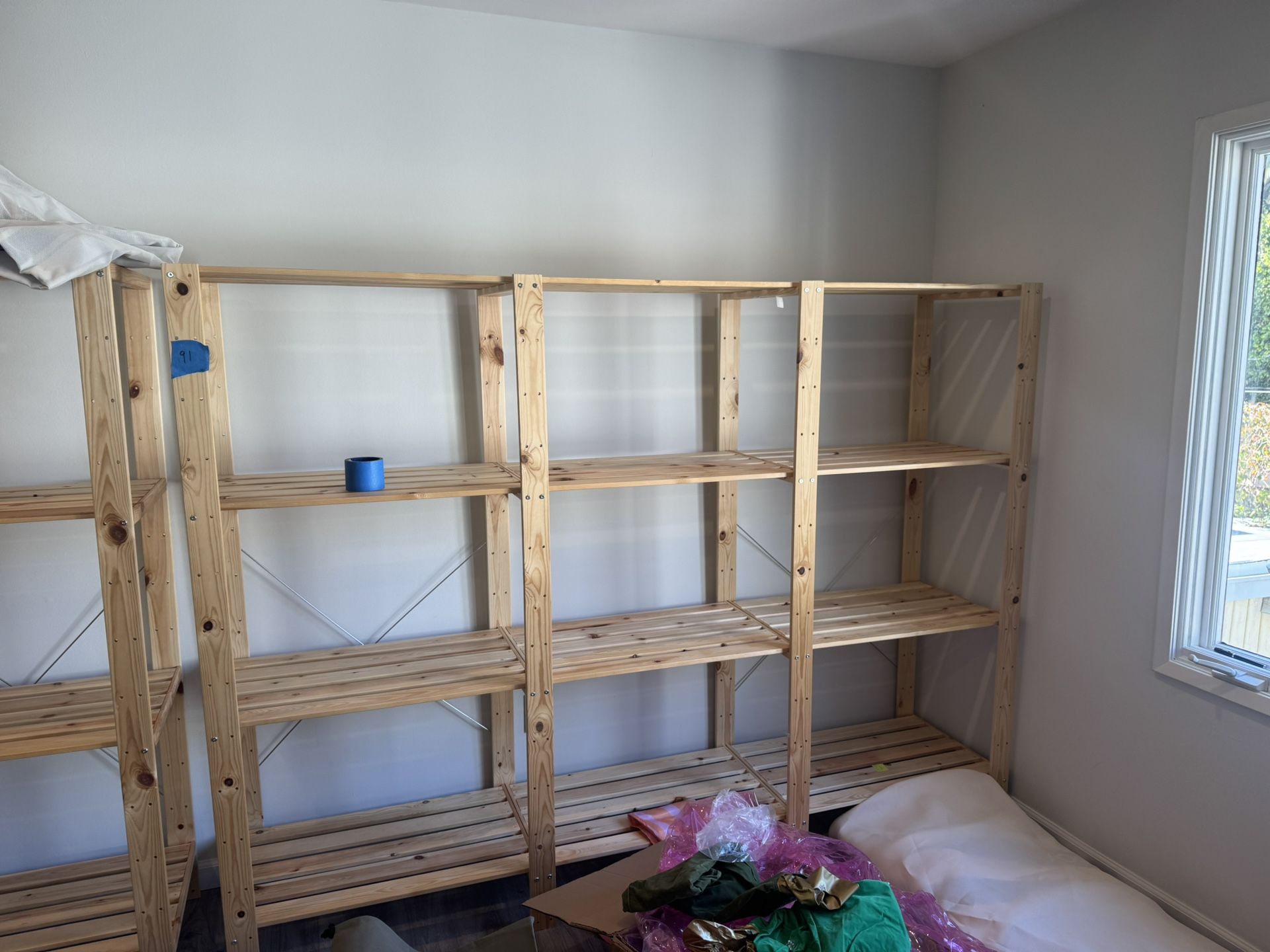 IKEA wood shelves for stores storage so it would