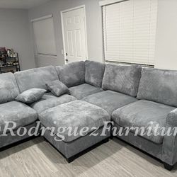 BRAND NEW DARK GRAY CORDUROY SECTIONAL WITH OTTOMAN