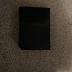 Black Wii with cords 