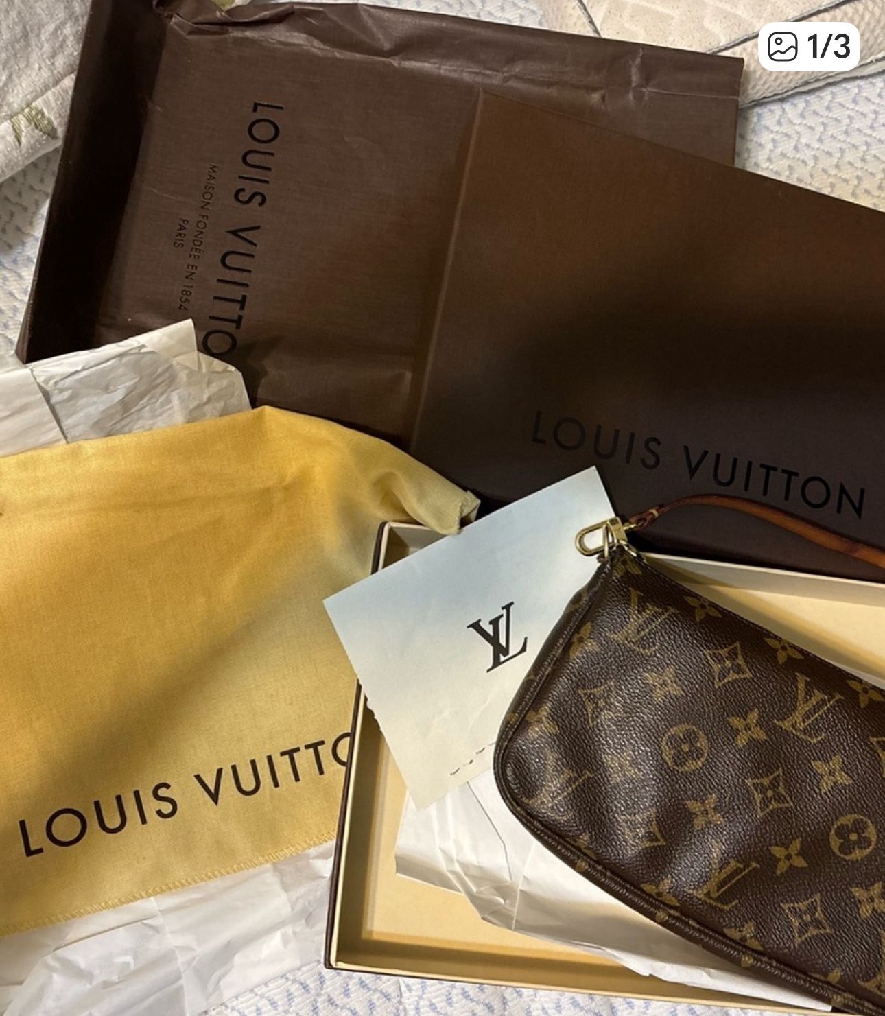 Louis Vuitton Clutch