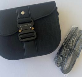 black dior sidebag, comes with a strap also