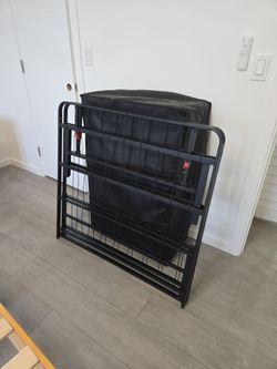 Twin-size folding bed set — metal platform bed frame + 4-inch folding mattress.