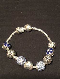 Women’s sterling silver plated sky blue love charm bracelet 7/1/2 no refunds