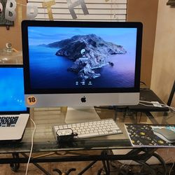 MACBOOK Pro And Imac Along With Airpods
