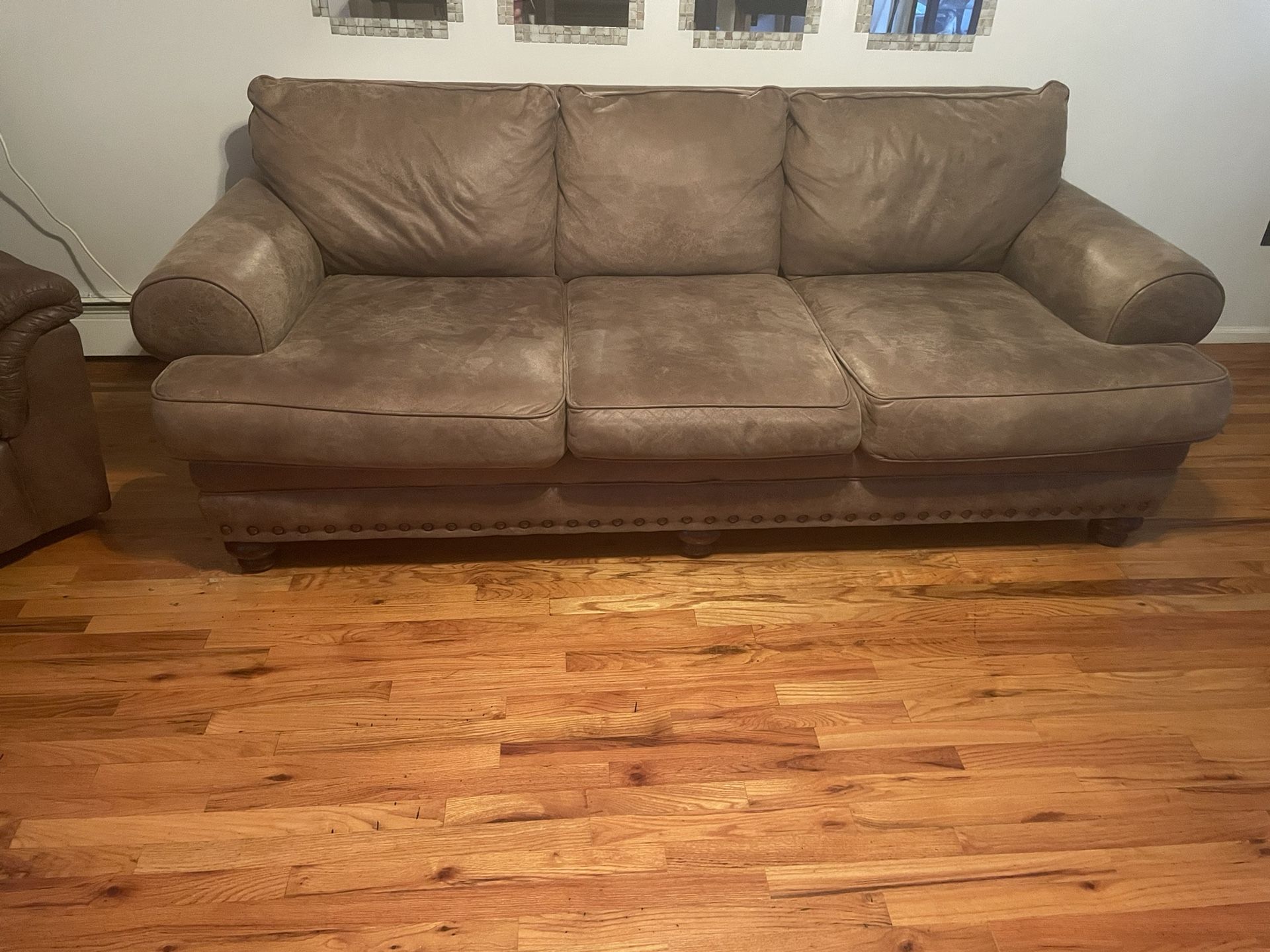 Brown Faux Leather Sofa H33”D46”L91”