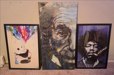 Framed posters and Einstein painting