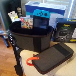 Nintendo Switch With Case, And Super Smash Bros. Game