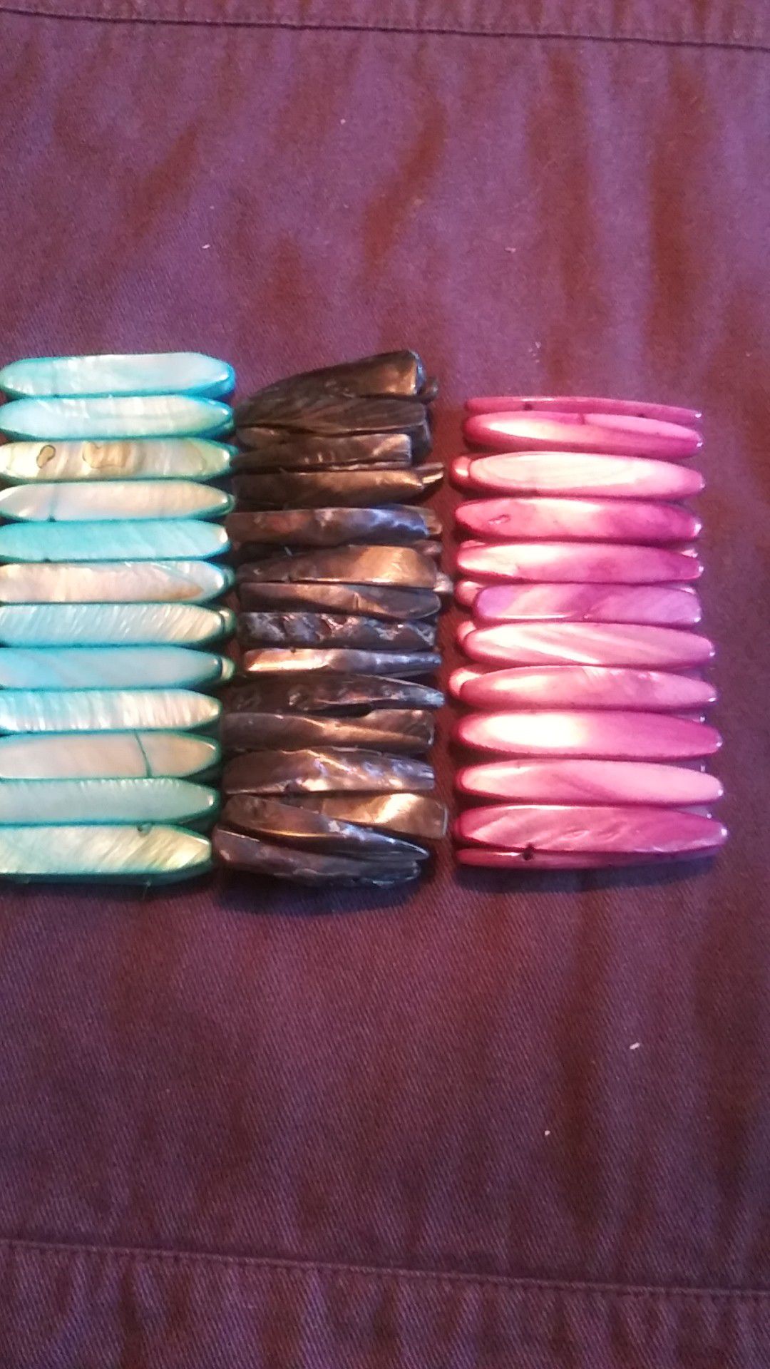 Blue, black and purple shell bracelets