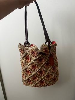 August brand woven purse