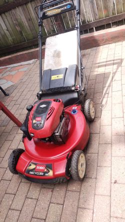 Gas Toro lawnmower shelf propelled