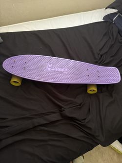 purple nickel sized penny board
