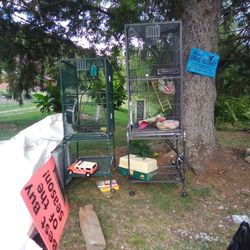 Two Pet Cages With Accessories 