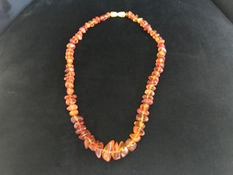 Vintage Authentic Amber Necklace 18” $50 This is a chunky vintage Baltic amber bead necklace featuring graduated cognac-colored stones.