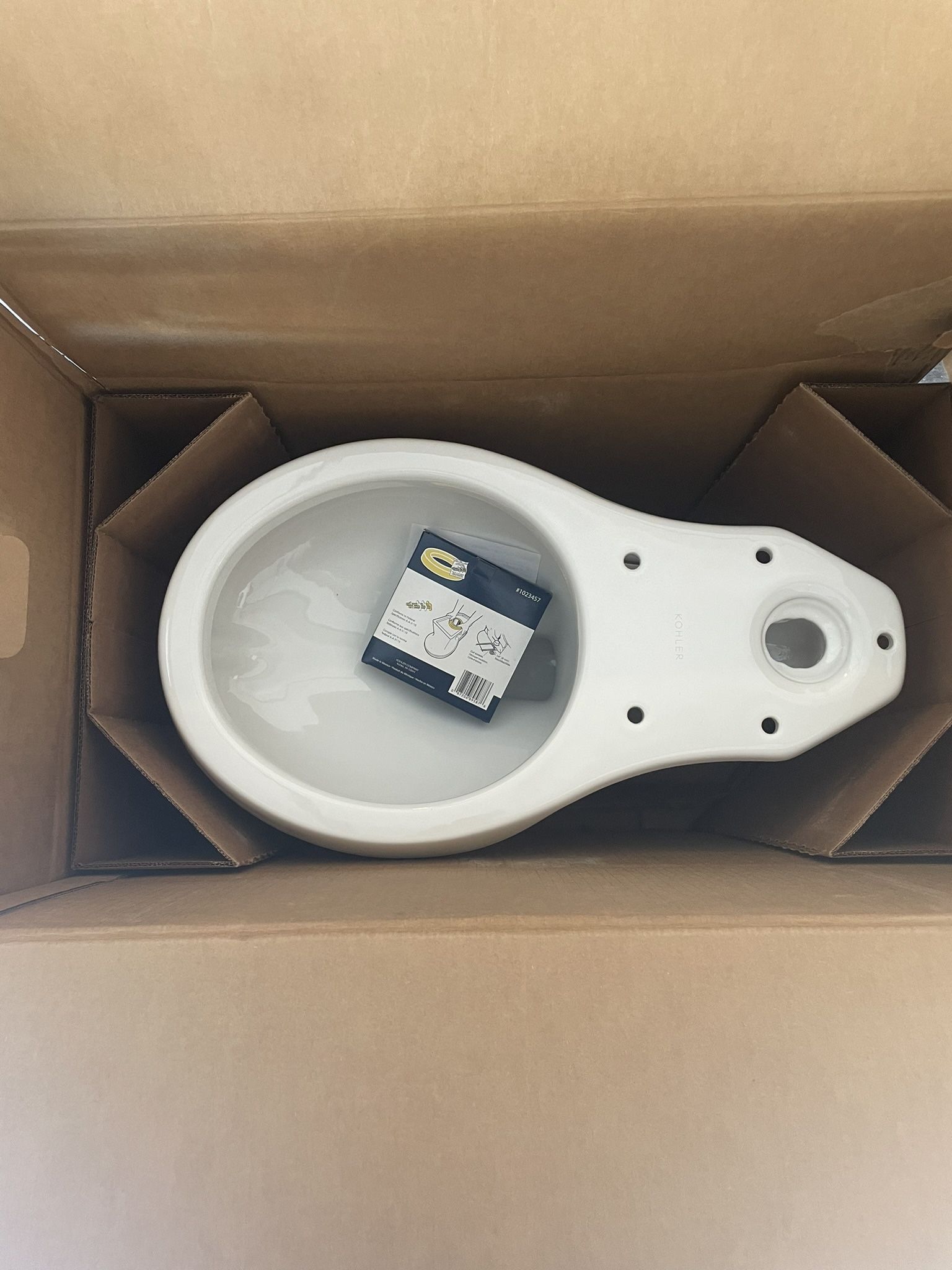 KOHLER Highline Arc 10 in. Rough In 2-Piece 1.28 GFP Single Flush Round Chair Height Toilet in White with Soft Close Seat 