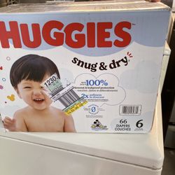 HUGGIES  SIZE  6     66     pañales