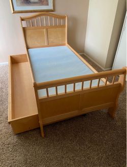 Wood twin bed with trundle and board, (mattresses NOT included)