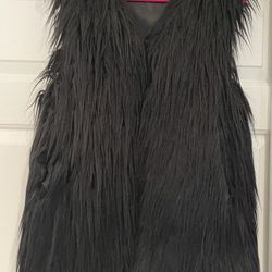 Foxiedox black vest. Perfect condition. Size small. 