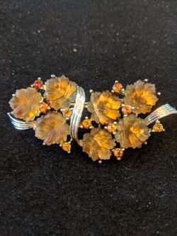 $10. Vintage Coro glass oakleaf amber colored brooch with amber colored rhinestones. 2.5 in long and 1 in wide.