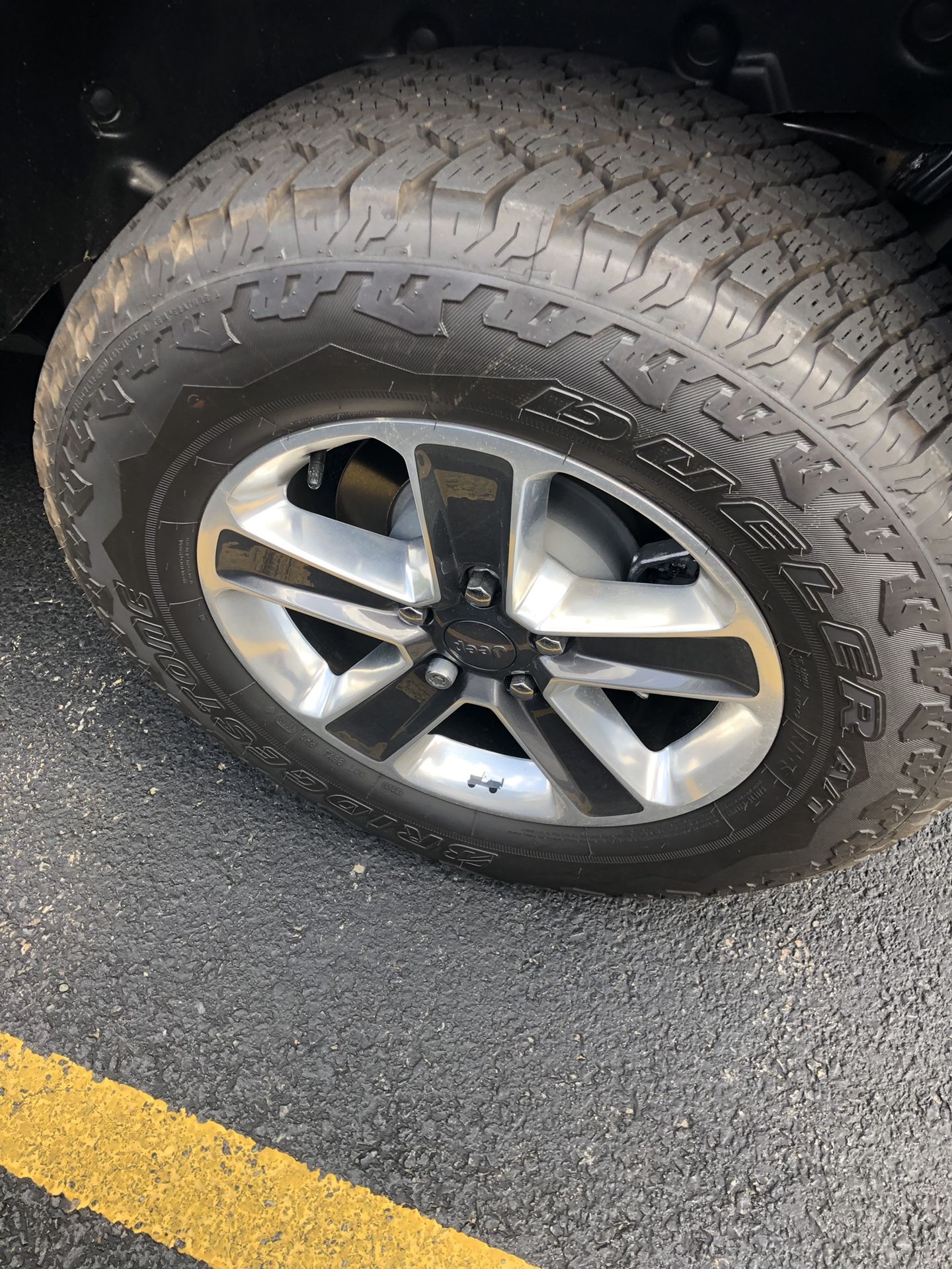 Jeep Wrangler wheels and tires .