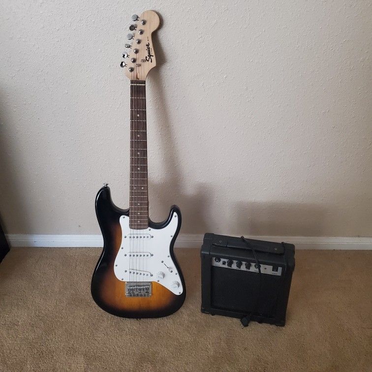 Fender Squier Stratocaster 3/4 Electric Guitar And Amplifier