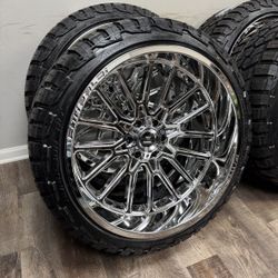NEW 24x12 mirror chrome fittipaldi wheels wrapped in 285/40r24 RBP tires