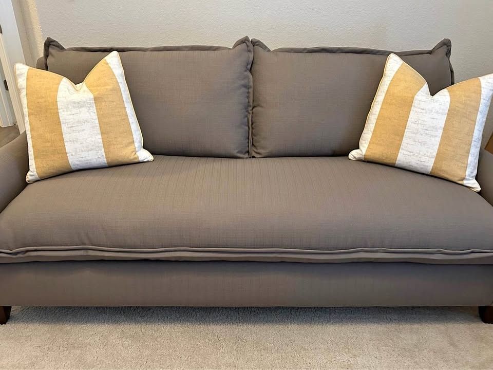 GRAY SOFA W/ THROW PILLOWS BY STYLE-LINE FURNITURE INC.
