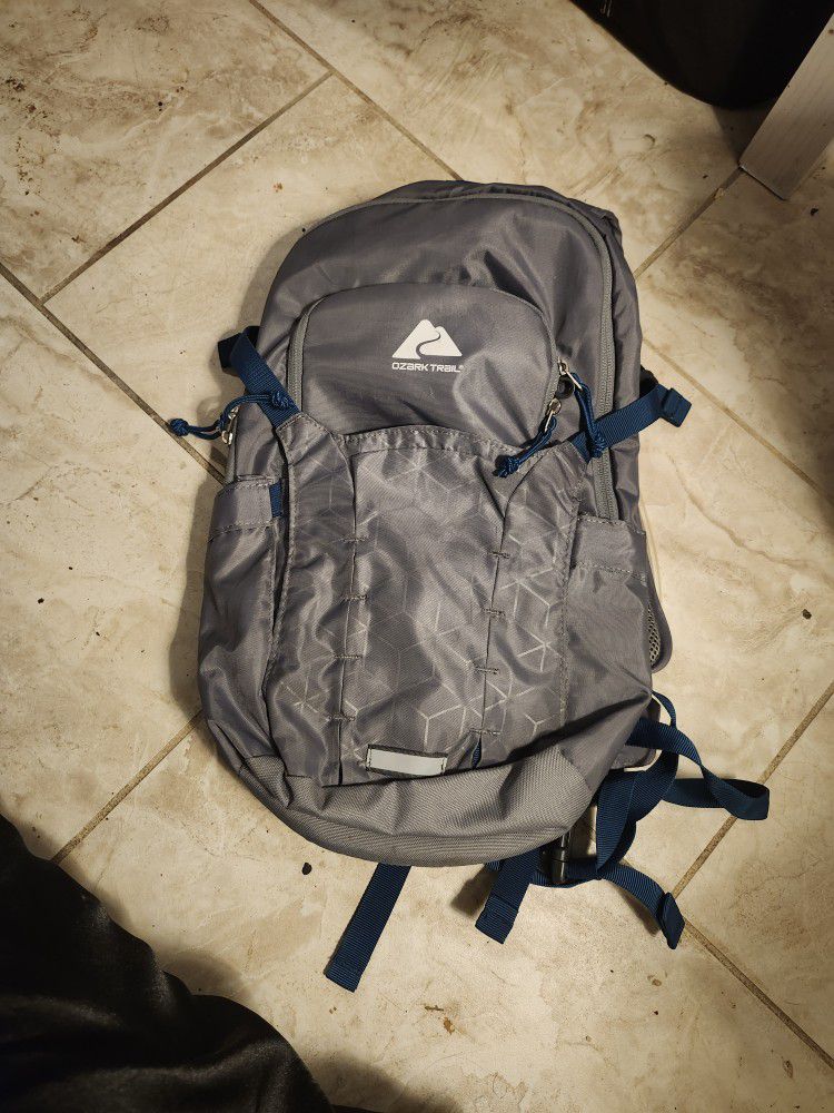 hiking backpack with 1gal water pouch 