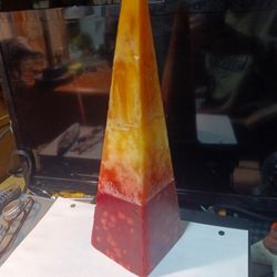 12 Inch Pyramid Shaped Candle Orange & Red.