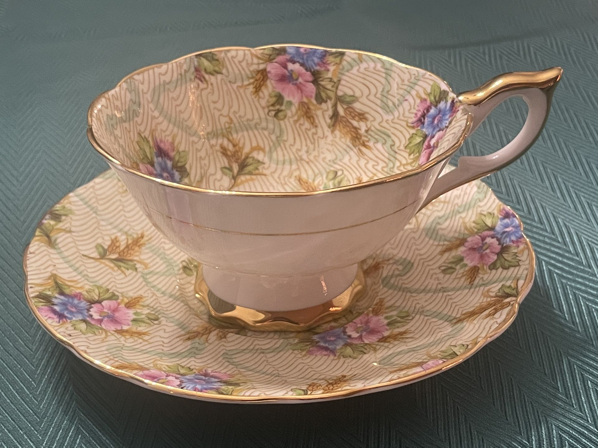 1930s Royal Stafford 'Elizabeth' pattern bone china teacup and saucer.