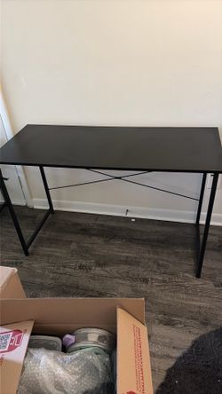 Black wooden and metal office desk