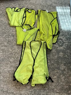 Lot of 5 Fluorescent Yellow Safety Vests. Used. Varying Sizes and Styles
