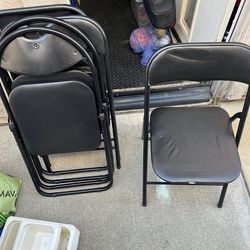 Black folding chairs