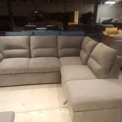 Grey Loveseat And Chaise With Attached Storage Ottoman