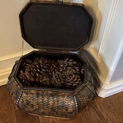 Decorative basket with pine cones