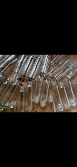 1 ounce glass bottles with rollers and caps