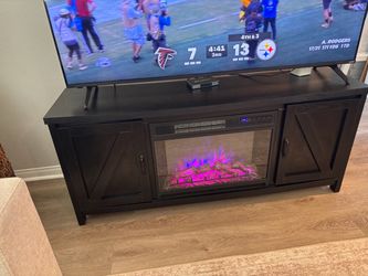 Entertainment center with electric fire place