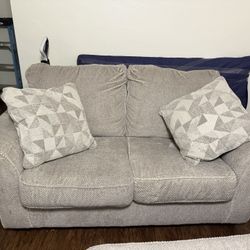 Ashley Love Seat And Ottoman 