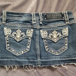 L A IDOL DISTRESSED JEAN MINI SKIRT