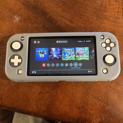 Switch Lite W/128 gigabyte SD card