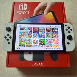 NINTENDO SWITCH OLED with 100 POPULAR GAMES