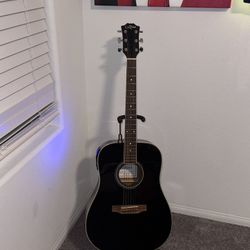 Guitar With Amplifier And Stand