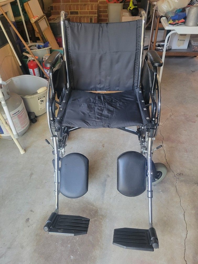 Wheelchair With Foot And Leg Rests