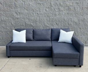 Gray IKEA Friheten sleeper sofa